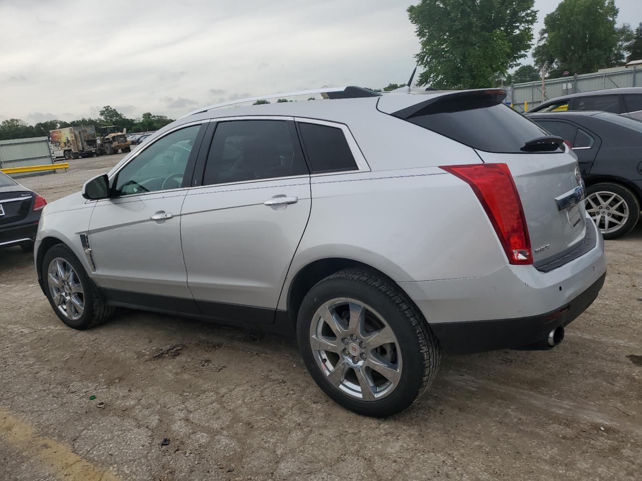 2012 Cadillac SRX VIN 3GYFNBE33CS606460 Copart auction photo, water/flood / minor dent/scratches damage thumbnail 2
