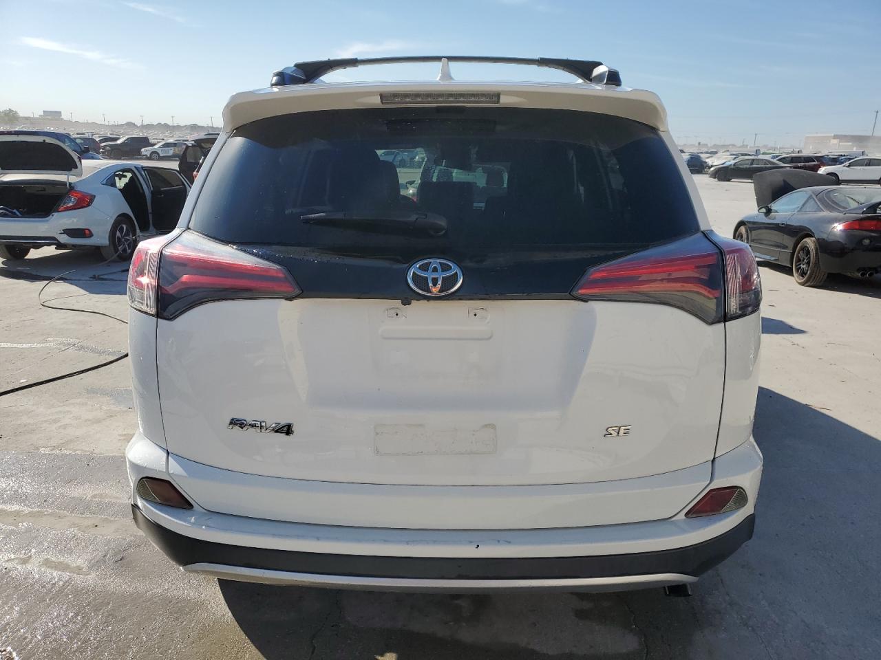 2016 Toyota RAV 4 VIN JTMNFREV2GJ078703 Copart auction photo, front end / minor dent/scratches damage thumbnail 6