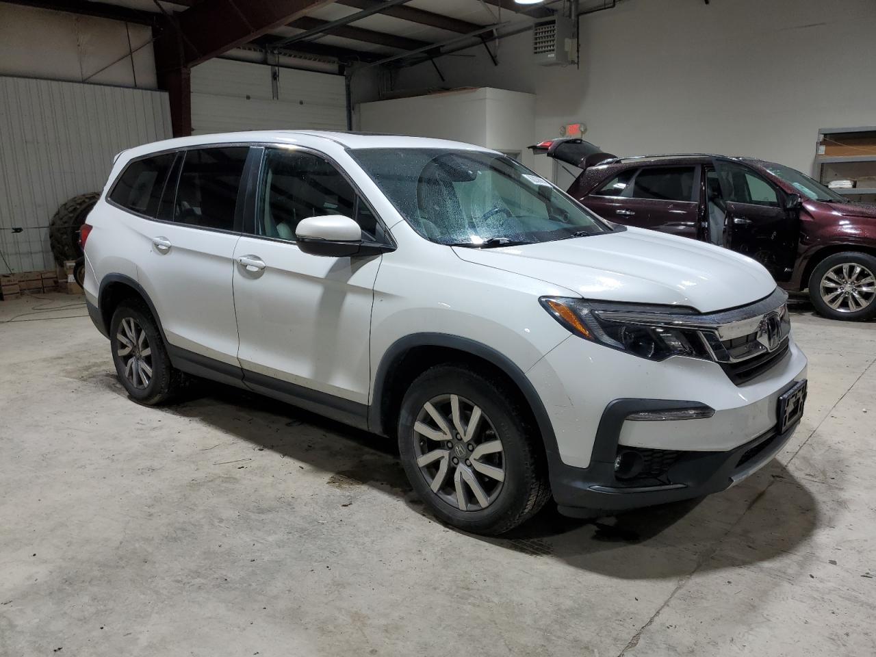 2020 Honda Pilot VIN 5FNYF6H57LB002113 Copart auction photo, rear end damage thumbnail 4