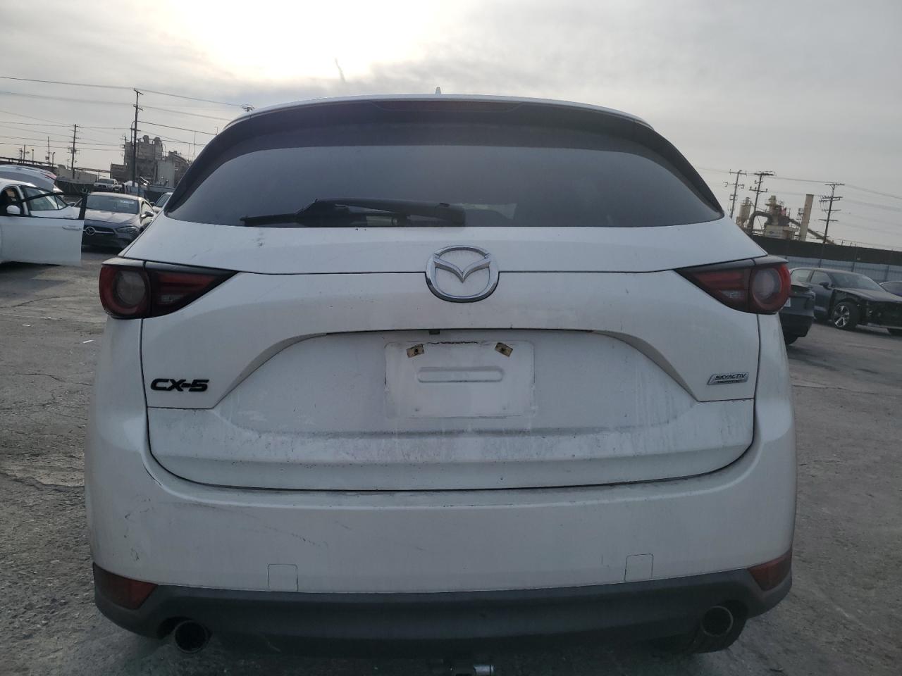 2017 Mazda CX-5 VIN JM3KFADL2H0131984 Copart auction photo, undercarriage / all over damage thumbnail 6