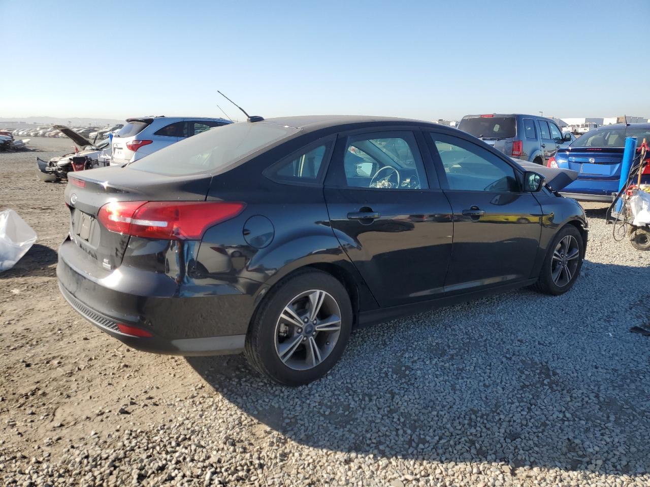 2017 Ford Focus VIN 1FADP3FE6HL277947 Copart auction photo, front end damage thumbnail 3