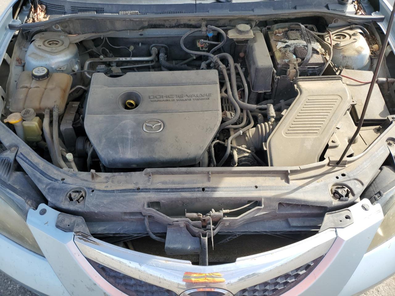 2007 Mazda 3 VIN JM1BK12G571673129 Copart auction photo, minor dent/scratches damage thumbnail 11