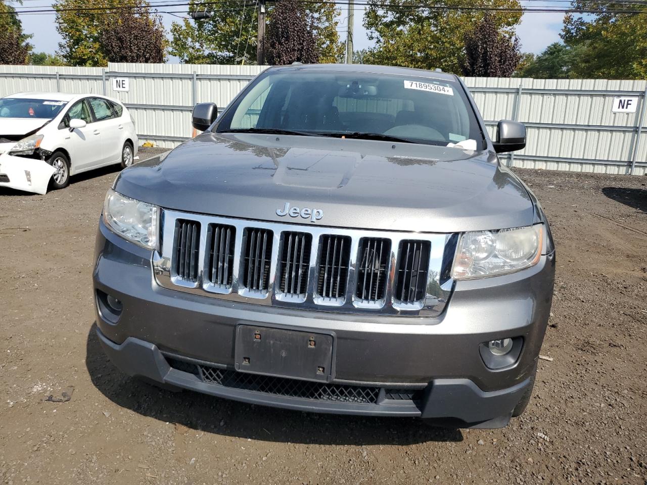 2011 Jeep Grand Cherokee VIN 1J4RR4GG5BC717755 Copart auction photo, front end / minor dent/scratches damage thumbnail 5