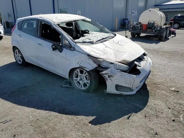 2015 Ford Fiesta VIN 3FADP4EJ6FM217246 Copart auction photo, all over damage thumbnail 11
