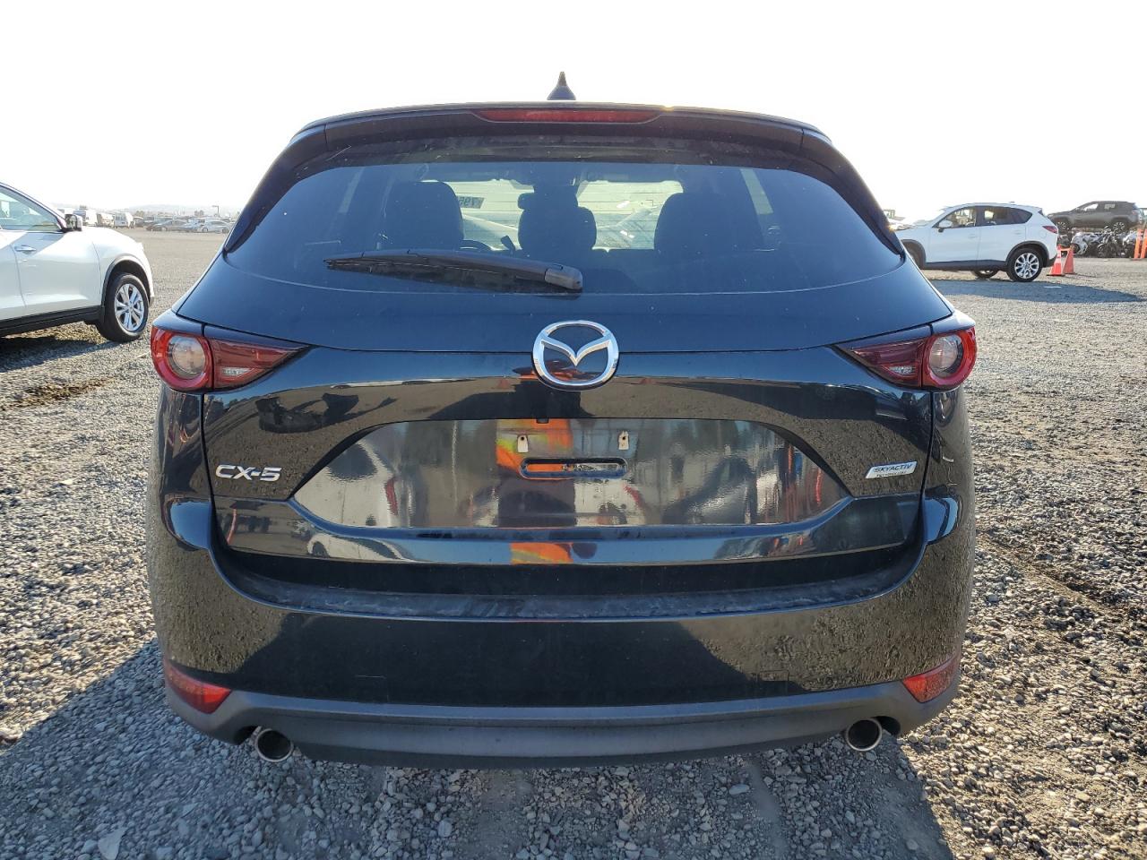 2019 Mazda CX-5 VIN JM3KFACM8K0541206 Copart auction photo, front end / side damage thumbnail 6
