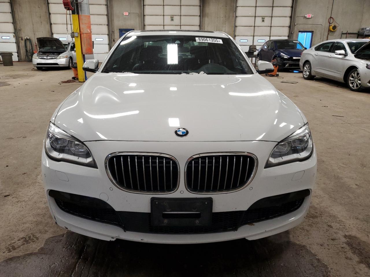 2015 BMW 7er VIN WBAYB6C54FD965787 Copart auction photo, rear end / front end damage thumbnail 5