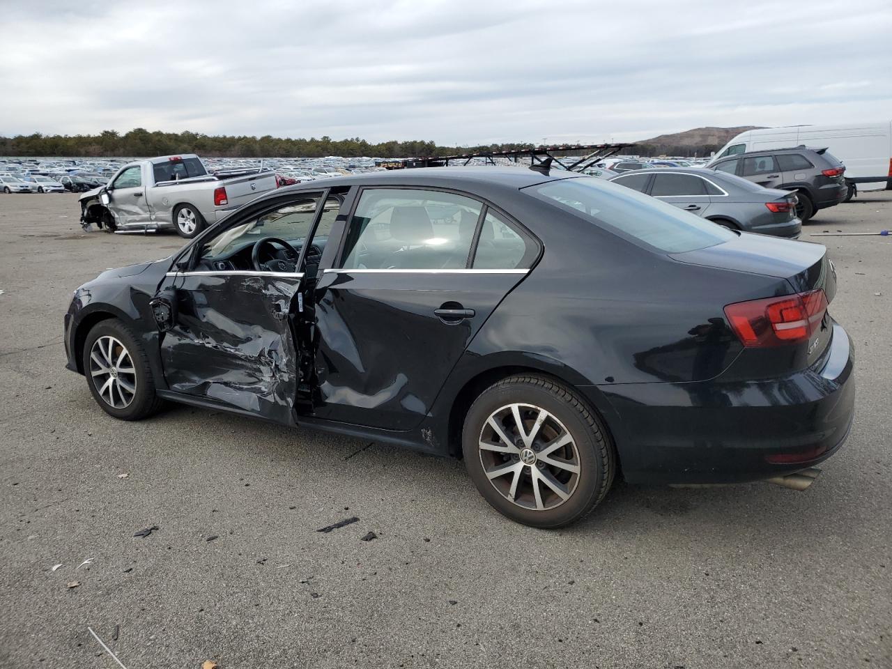 2017 Volkswagen Jetta VIN 3VWDB7AJ4HM340933 Copart auction photo, side / minor dent/scratches damage thumbnail 2