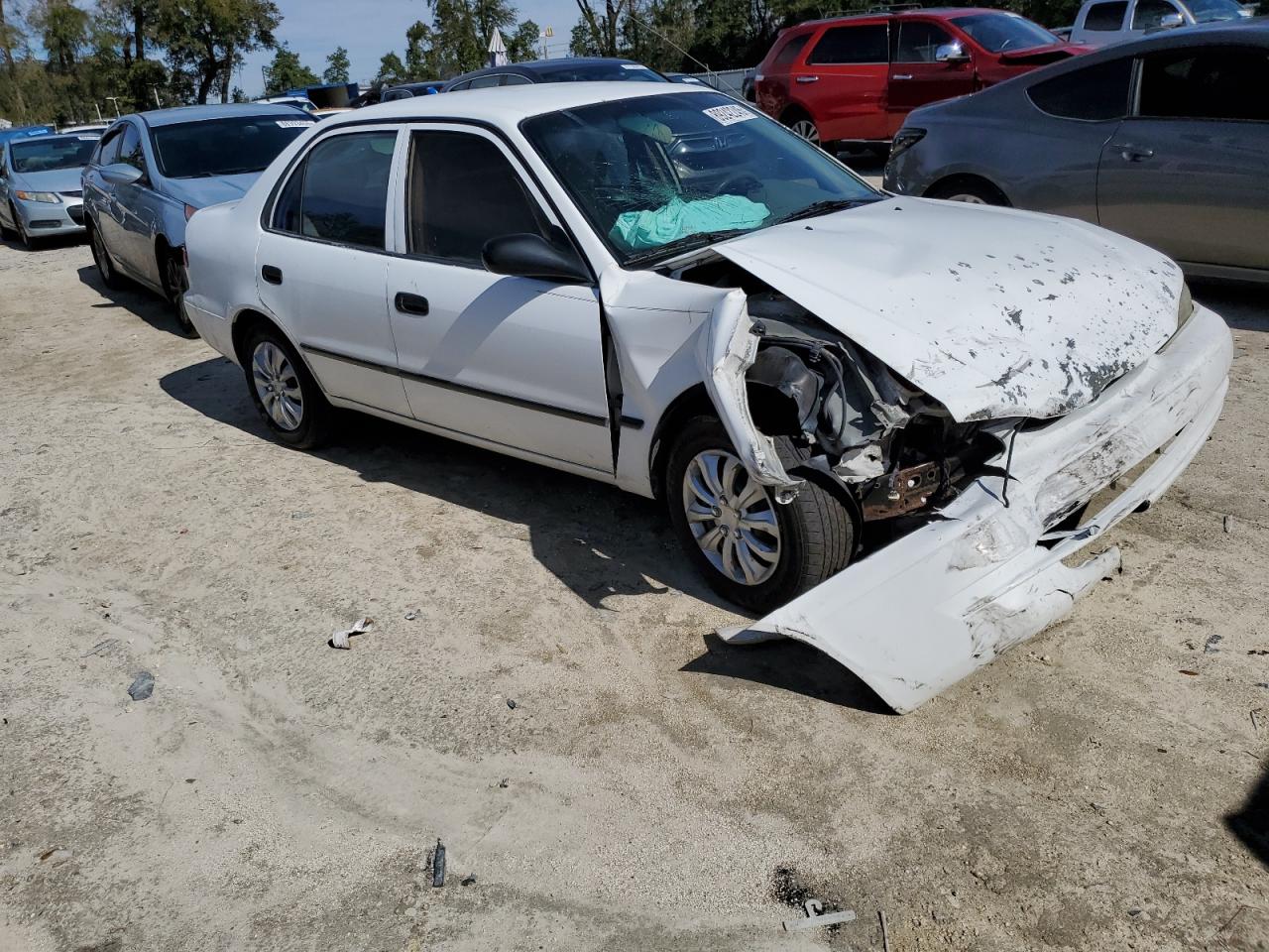 2000 Toyota Corolla VIN 2T1BR12E9YC309884 Copart auction photo, front end damage thumbnail 4