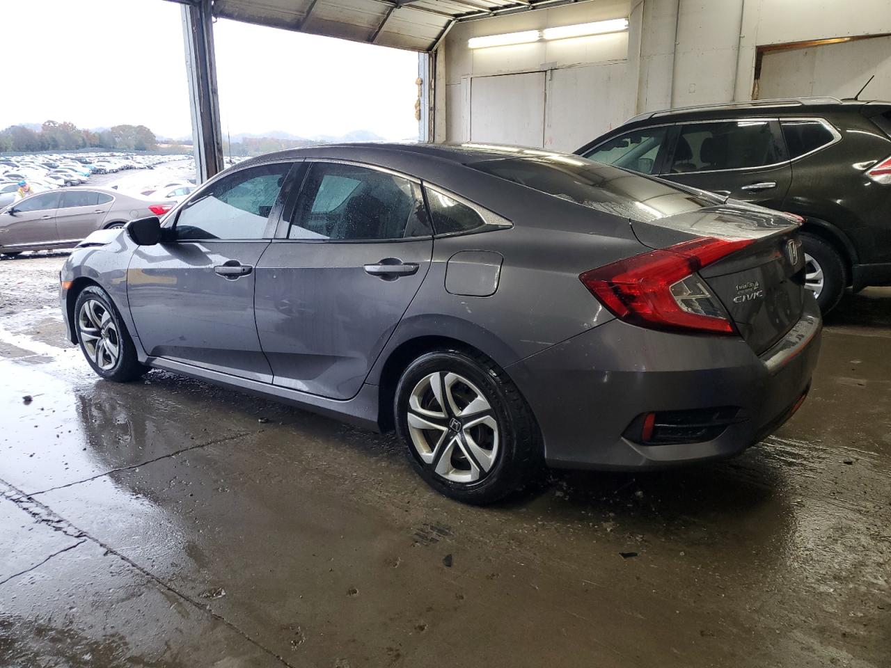 2018 Honda Civic VIN 19XFC2F57JE029147 Copart auction photo, front end / minor dent/scratches damage thumbnail 2