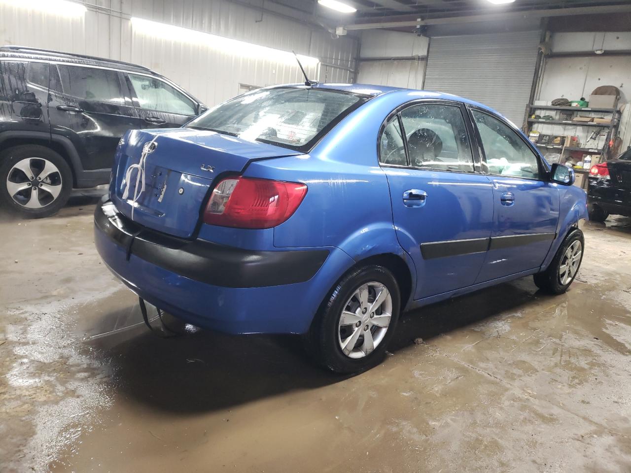 2009 KIA Rio VIN KNADE223X96489147 Copart auction photo, front end damage thumbnail 3