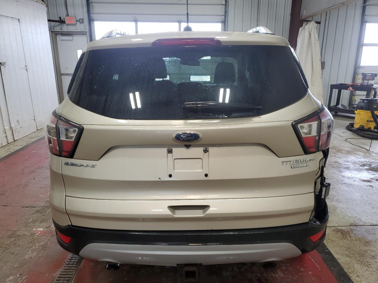 2017 Ford Escape VIN 1FMCU0J94HUB22987 Copart auction photo, side / rear end damage thumbnail 6