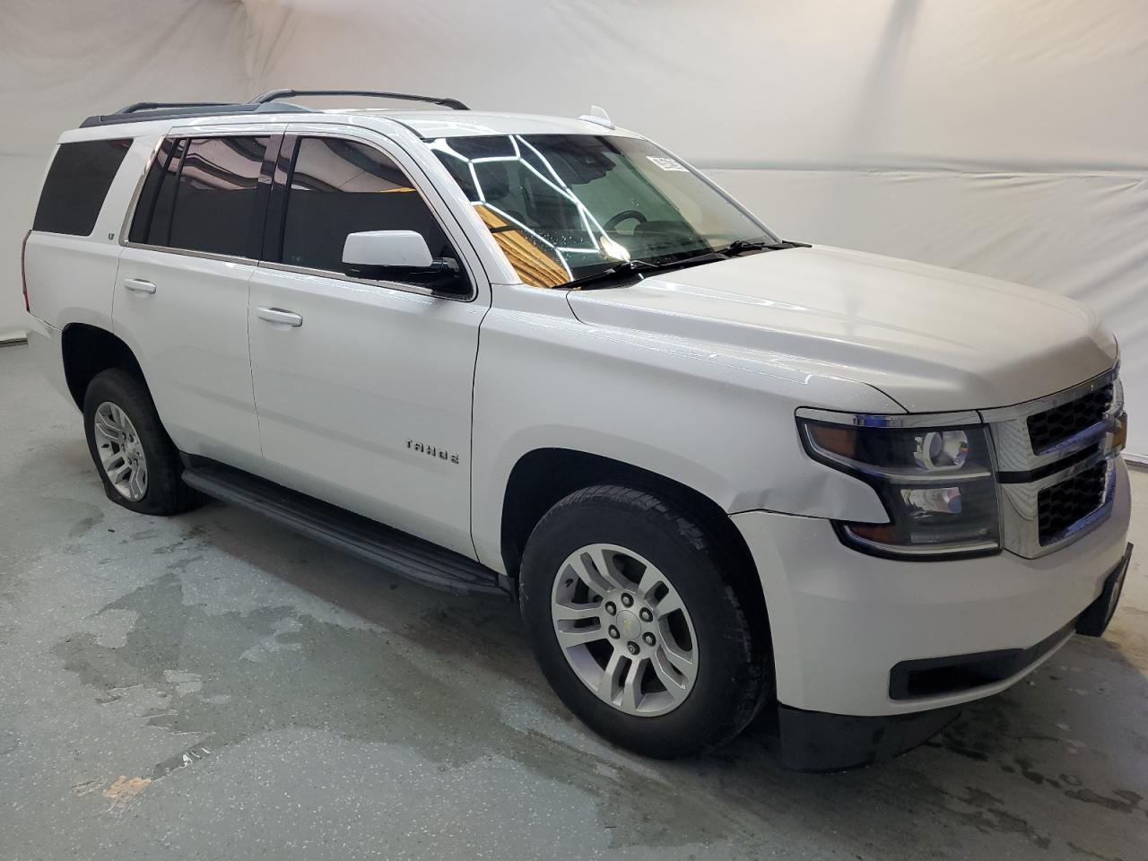 2017 Chevrolet Tahoe VIN 1GNSCBKC5HR390501 Copart auction photo, all over / minor dent/scratches damage thumbnail 4