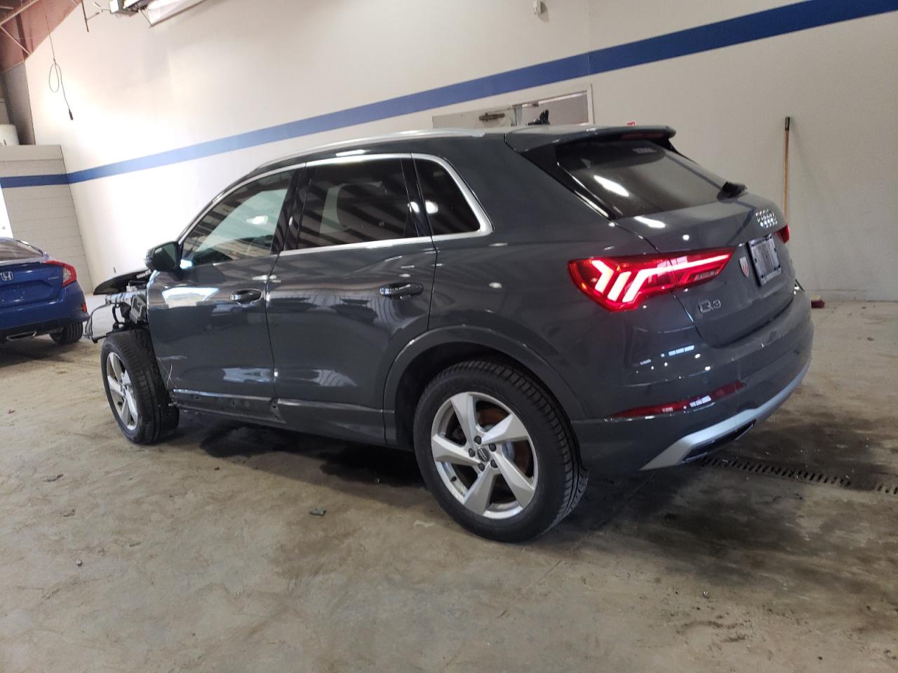 2020 Audi Q3 VIN WA1AECF32L1040520 Copart auction photo, front end / stripped damage thumbnail 2