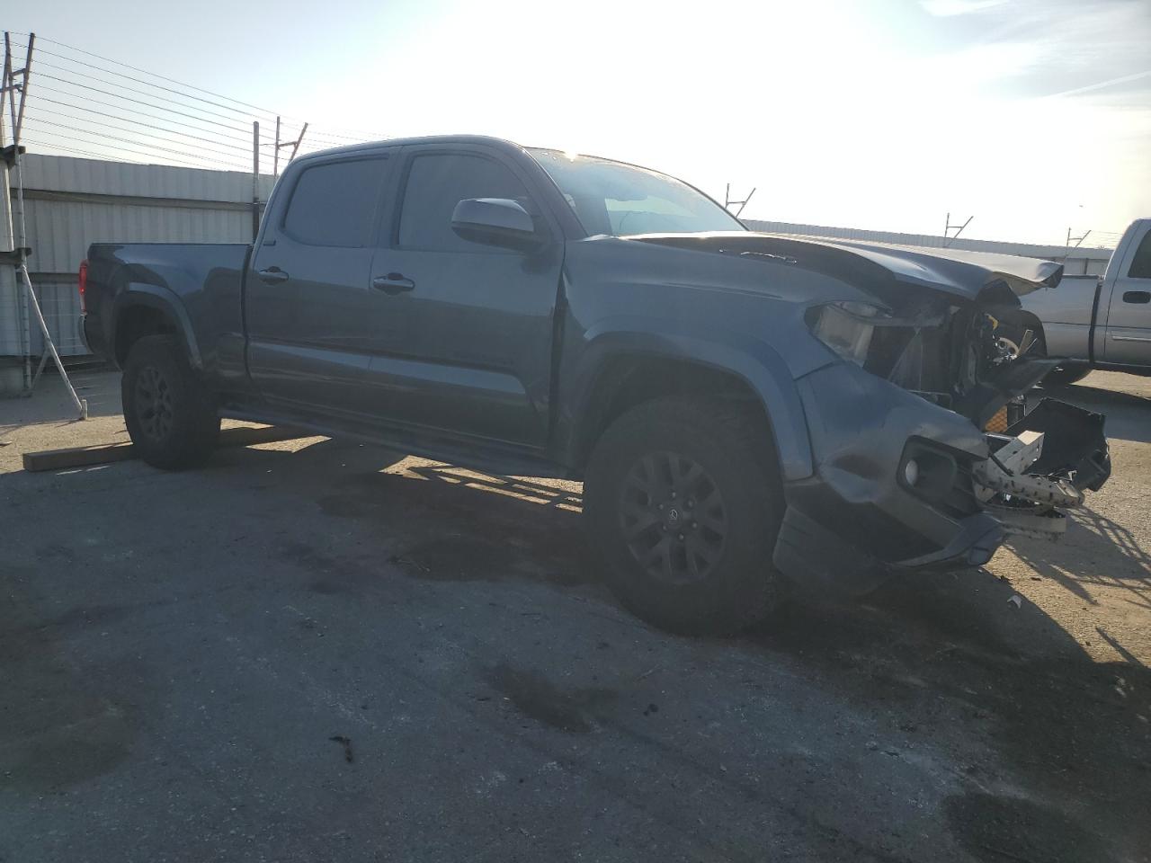 2021 Toyota Tacoma VIN 3TMDZ5BN2MM101640 Copart auction photo, all over damage thumbnail 4