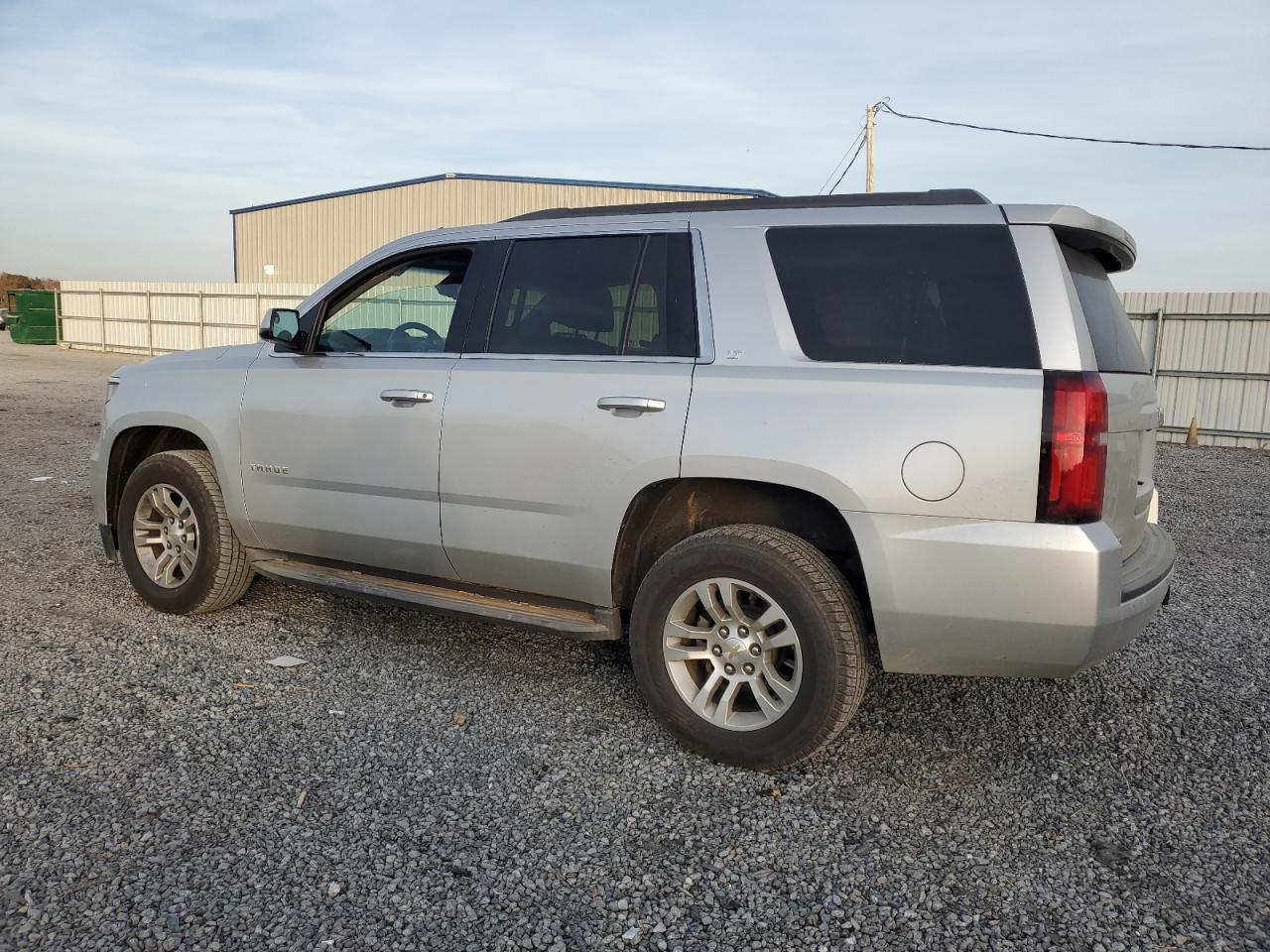 2015 Chevrolet Tahoe VIN 1GNSKBKCXFR220344 Copart auction photo, water/flood / minor dent/scratches damage thumbnail 2