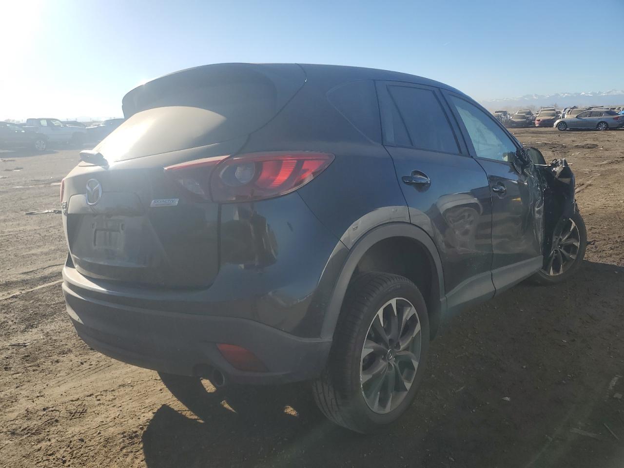 2016 Mazda CX-5 VIN JM3KE4DY2G0872571 Copart auction photo, front end / side damage thumbnail 3