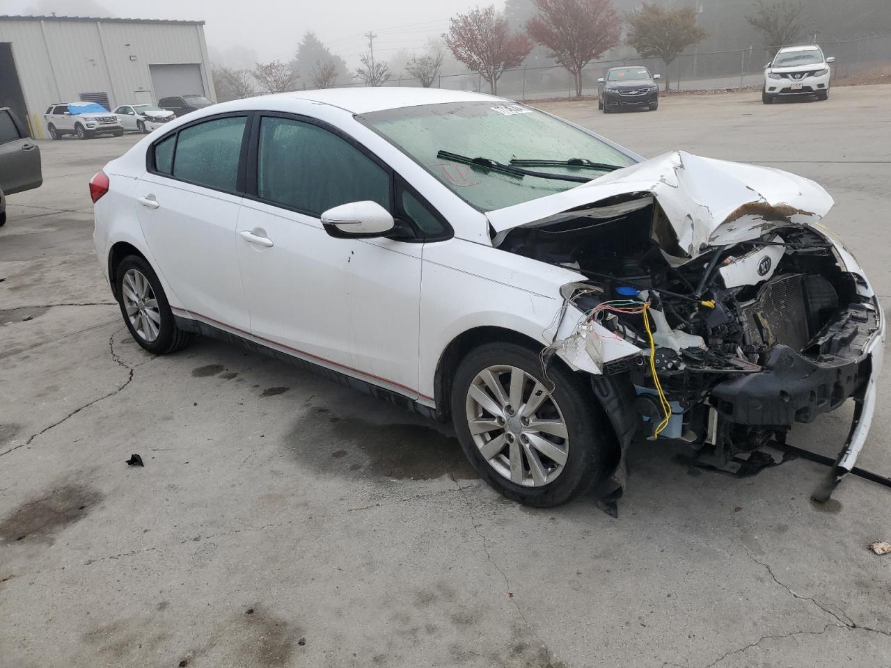 2014 KIA Forte VIN KNAFX4A64E5123579 Copart auction photo, front end damage thumbnail 4