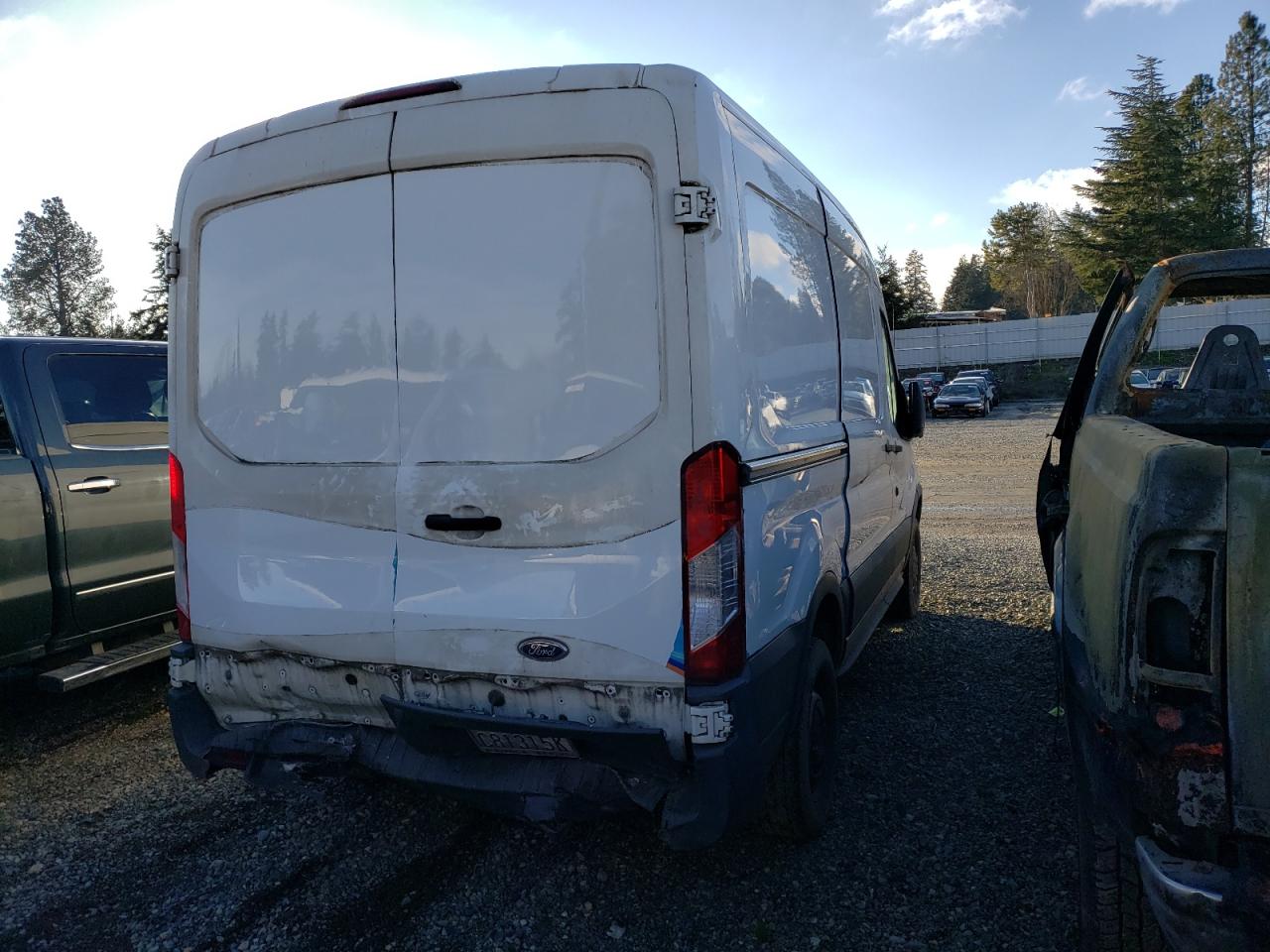 2017 Ford Transit VIN 1FTYR1CM1HKB21407 Copart auction photo, rear end / side damage thumbnail 3