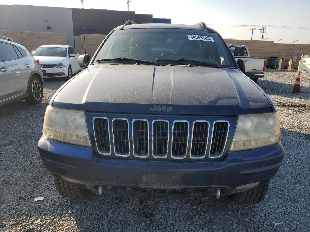 2001 Jeep Grand Cherokee VIN 1J4GW58N41C615283 Copart auction photo, vandalism / minor dent/scratches damage thumbnail 5