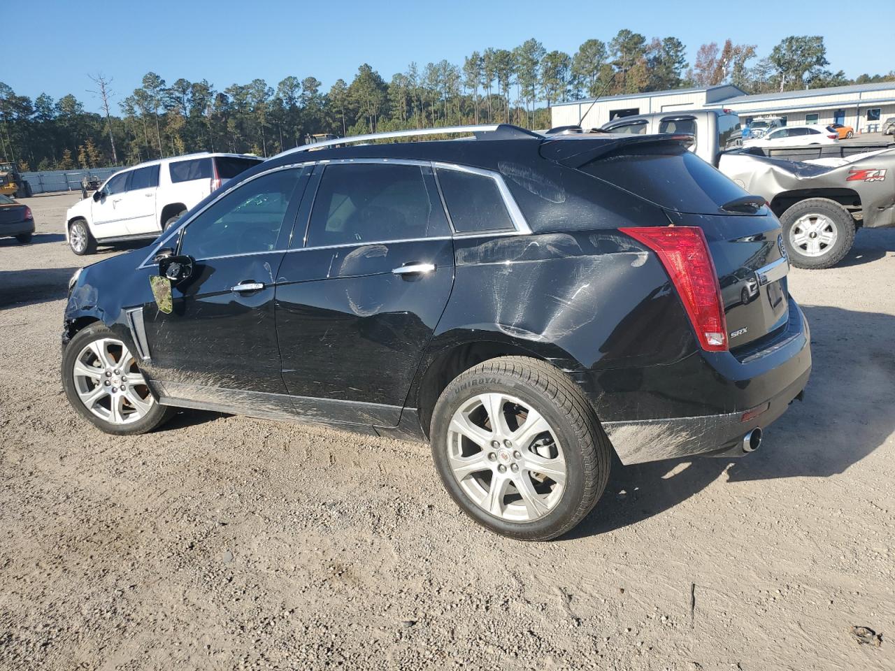 2016 Cadillac SRX VIN 3GYFNCE35GS548248 Copart auction photo, all over damage thumbnail 2
