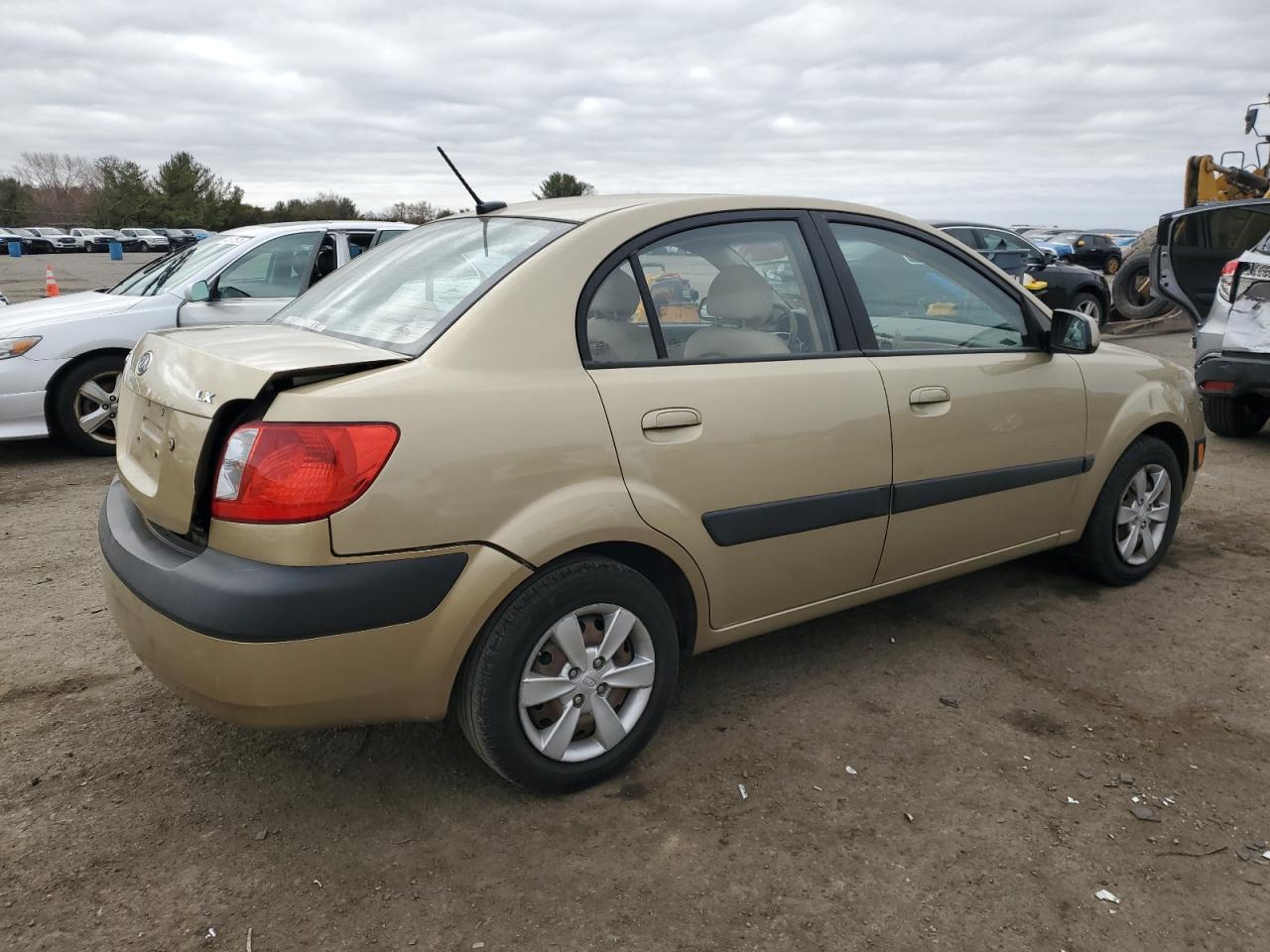 2009 KIA Rio VIN KNADE223996539049 Copart auction photo, rear end / front end damage thumbnail 3