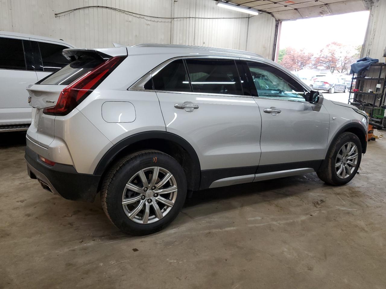 2022 Cadillac XT4 VIN 1GYFZDR4XNF106645 Copart auction photo, all over damage thumbnail 3