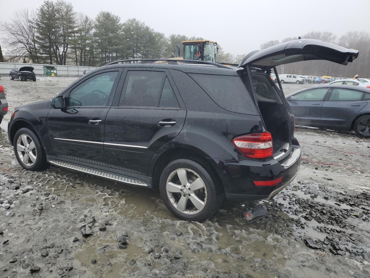 2009 Mercedes-Benz M-klasse VIN 4JGBB86E29A474099 Copart auction photo, side damage thumbnail 2