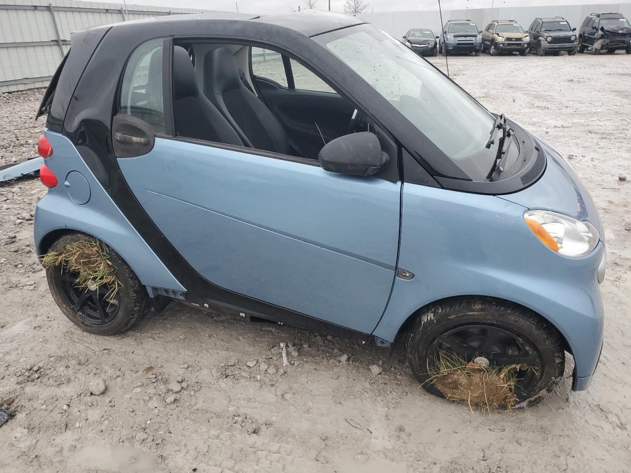 2015 Smart Fortwo VIN WMEEJ3BA4FK798057 Copart auction photo, all over damage thumbnail 4