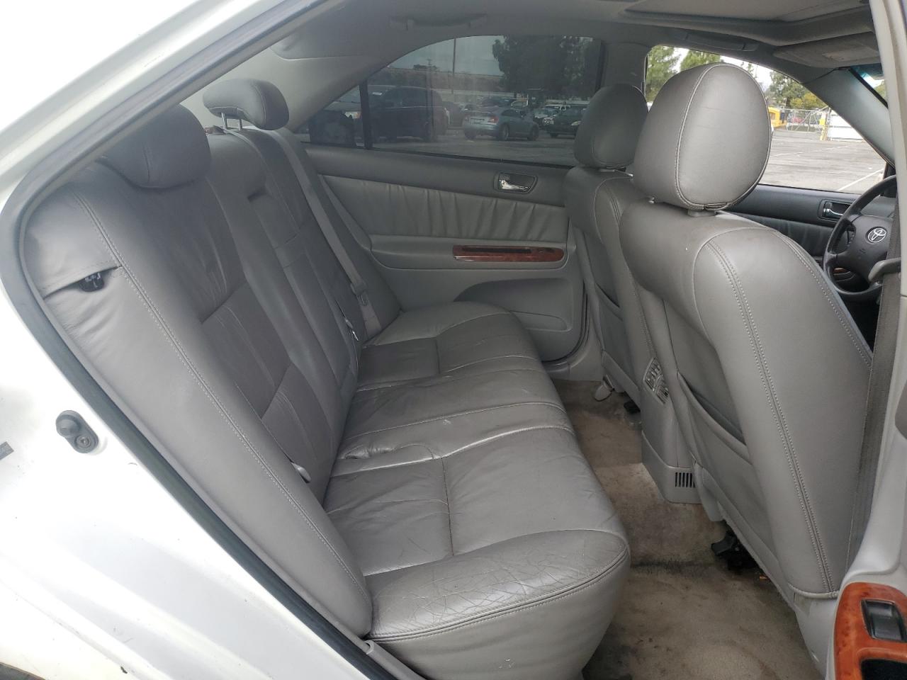 2003 Toyota Camry VIN JTDBF32KX30149382 Copart auction photo, side / all over damage thumbnail 11