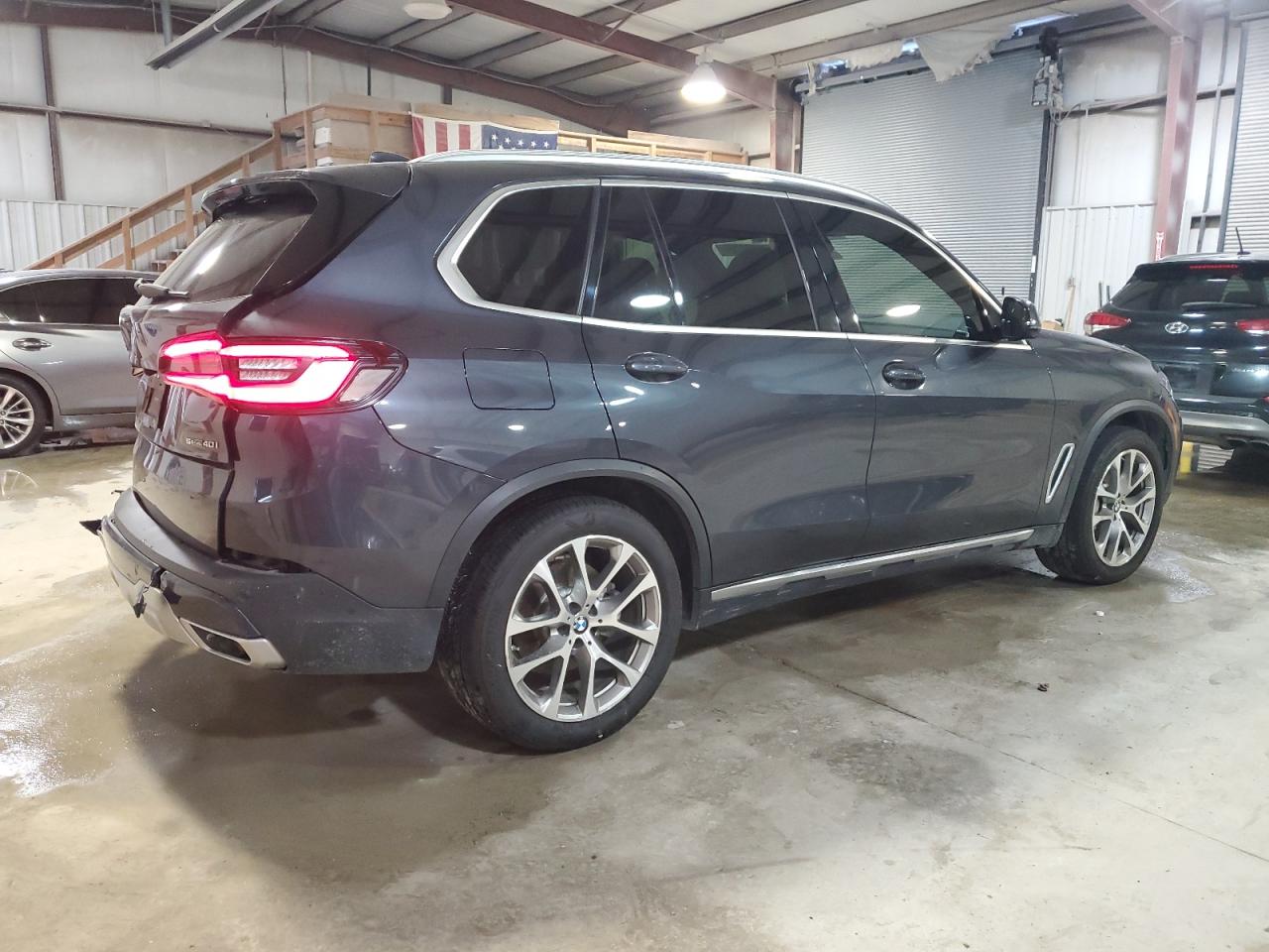 2020 BMW X5 VIN 5UXCR4C00L9C26093 Copart auction photo, rear end / minor dent/scratches damage thumbnail 3