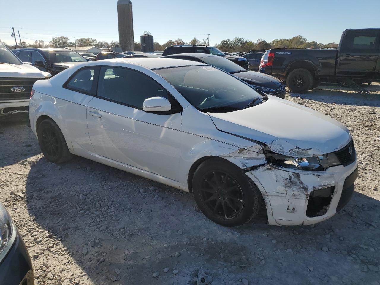 2011 KIA Forte VIN KNAFU6A20B5354704 Copart auction photo, front end / minor dent/scratches damage thumbnail 4