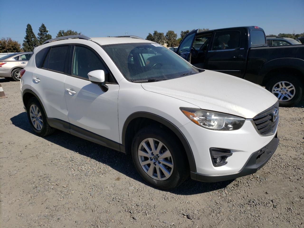 2016 Mazda CX-5 VIN JM3KE2CY2G0791883 Copart auction photo, rear end damage thumbnail 4