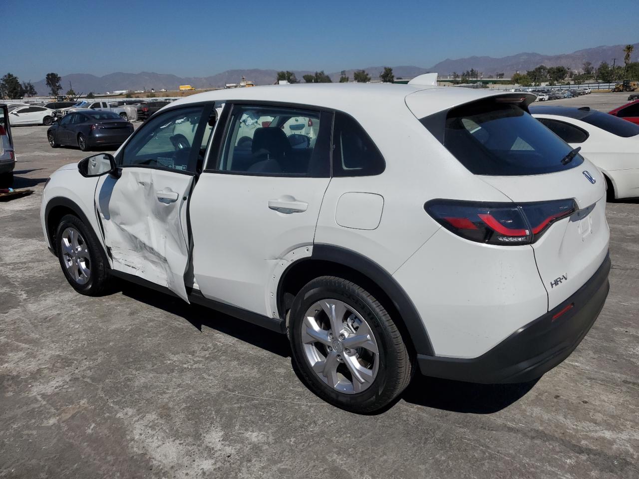 2023 Honda HR-V VIN 3CZRZ2H35PM740572 Copart auction photo, side / front end damage thumbnail 2