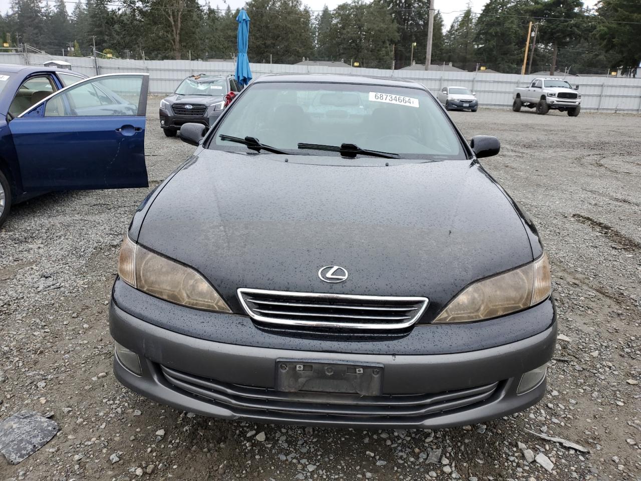 2001 Lexus ES VIN JT8BF28GX10297928 Copart auction photo, side damage thumbnail 5