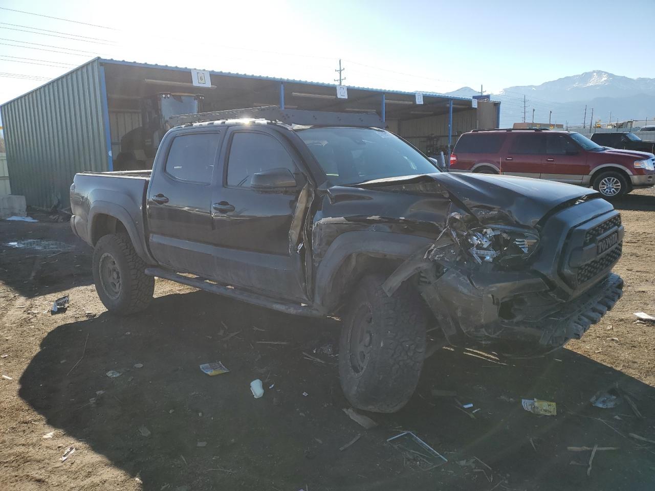 2018 Toyota Tacoma VIN 3TMCZ5AN1JM142561 Copart auction photo, front end / side damage thumbnail 4