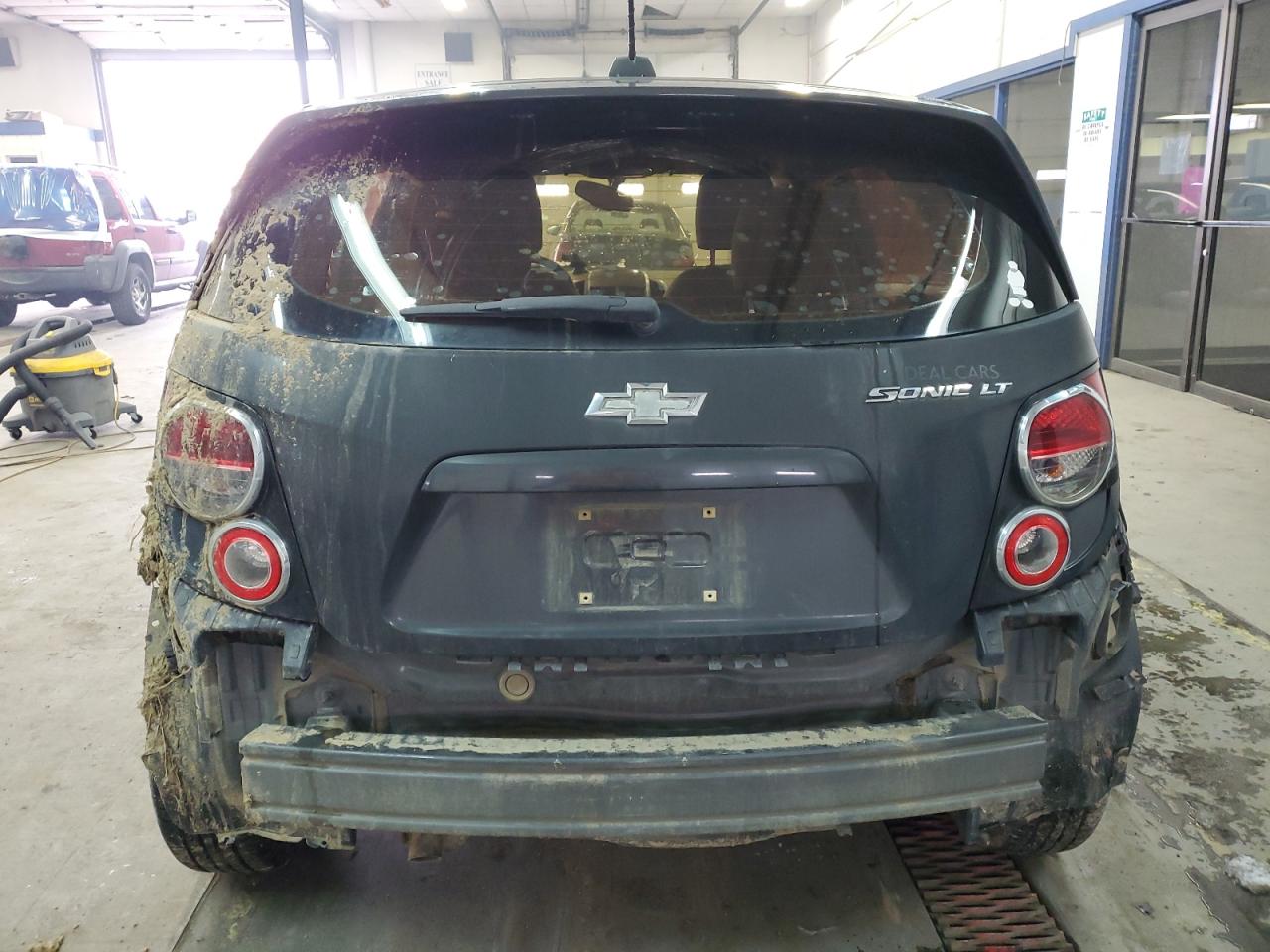 2015 Chevrolet Sonic VIN 1G1JC6SH1F4135063 Copart auction photo, all over damage thumbnail 6