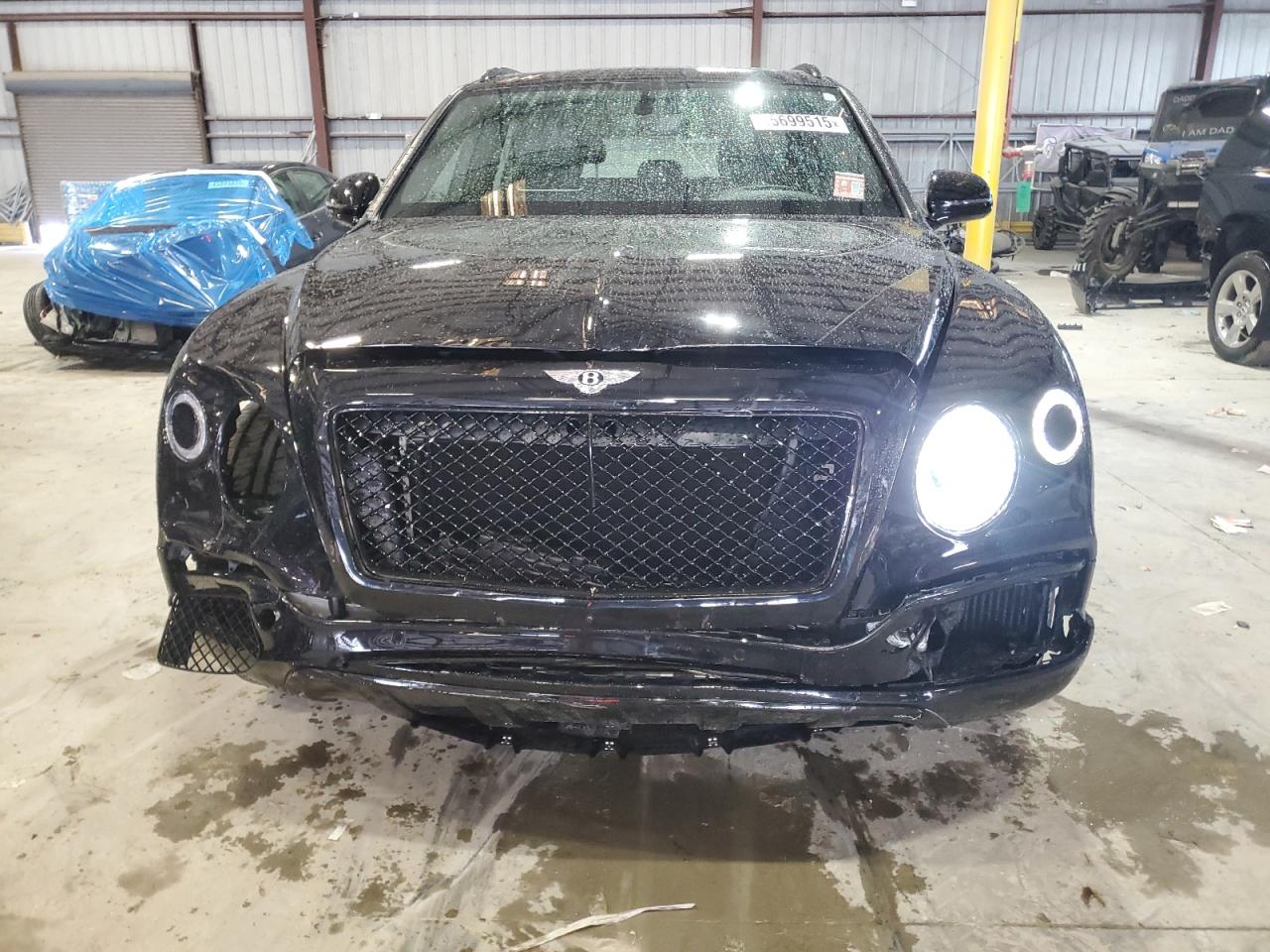 2019 Bentley Bentayga VIN SJAAM2ZV6KC024857 Copart auction photo, front end damage thumbnail 5