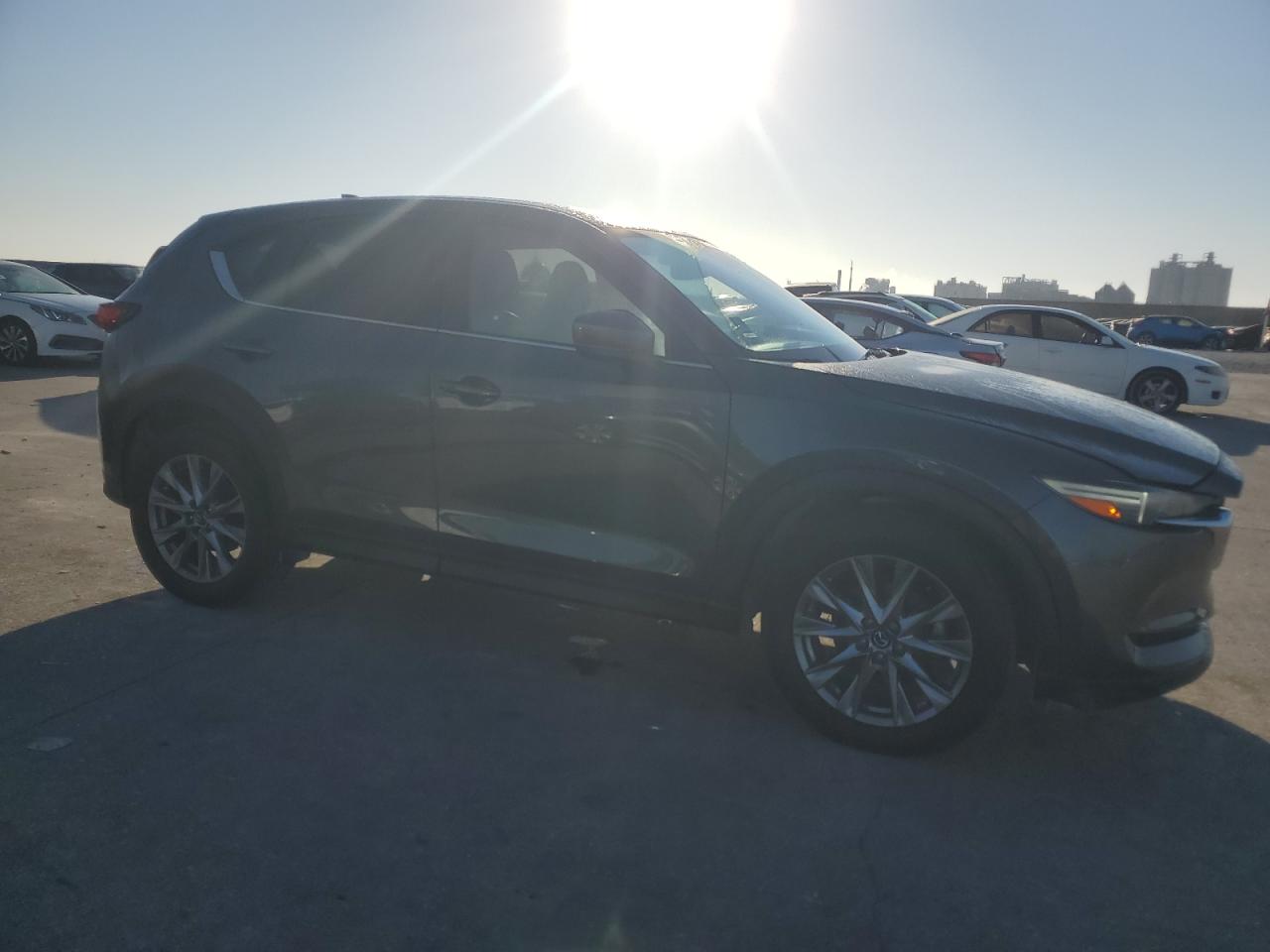 2021 Mazda CX-5 VIN JM3KFBAY6M0391286 Copart auction photo, water/flood damage thumbnail 4