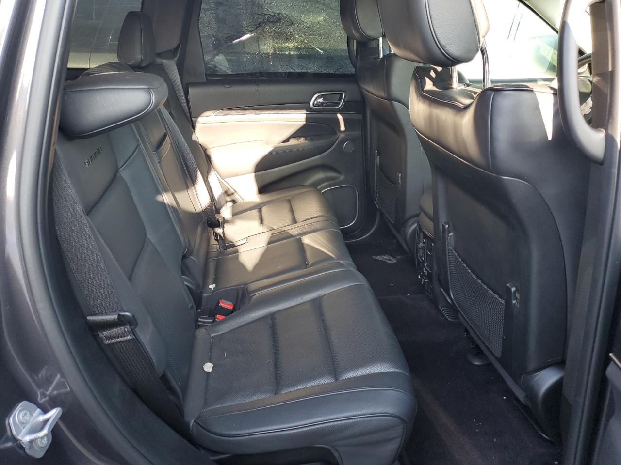 2017 Jeep Grand Cherokee VIN 1C4RJFJTXHC887584 Copart auction photo, front end / side damage thumbnail 11