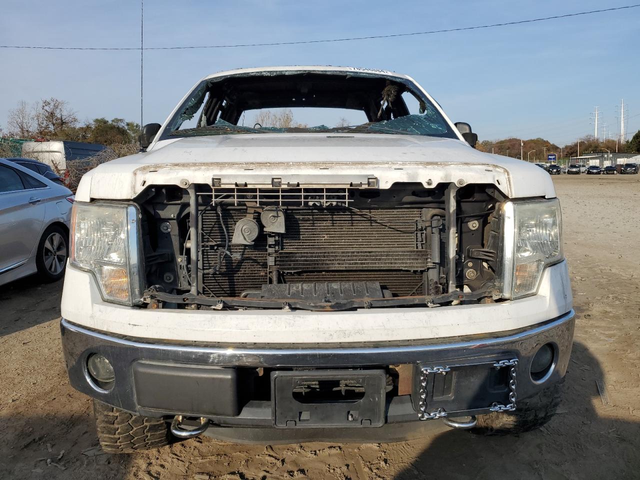 2012 Ford F-150 VIN 1FTFW1ET5CFA15418 Copart auction photo, burn - interior / front end damage thumbnail 5