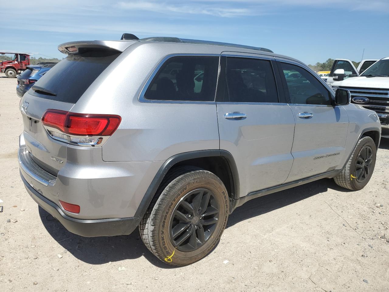 2021 Jeep Grand Cherokee VIN 1C4RJEBG3MC656516 Copart auction photo, side / minor dent/scratches damage thumbnail 3
