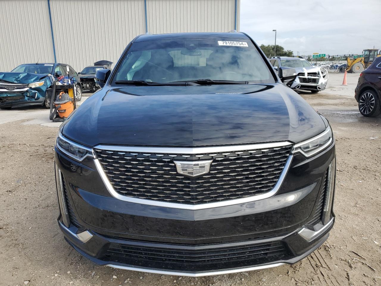 2022 Cadillac XT6 VIN 1GYKPCRS6NZ144644 Copart auction photo, all over damage thumbnail 5