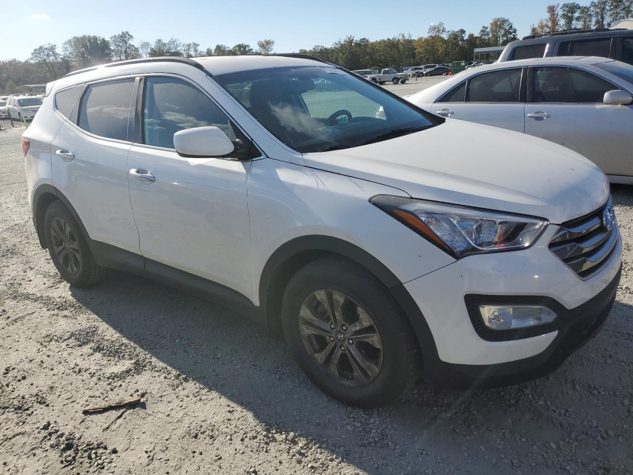 2016 Hyundai Santa Fe VIN 5XYZU3LB4GG316404 Copart auction photo, water/flood damage thumbnail 4