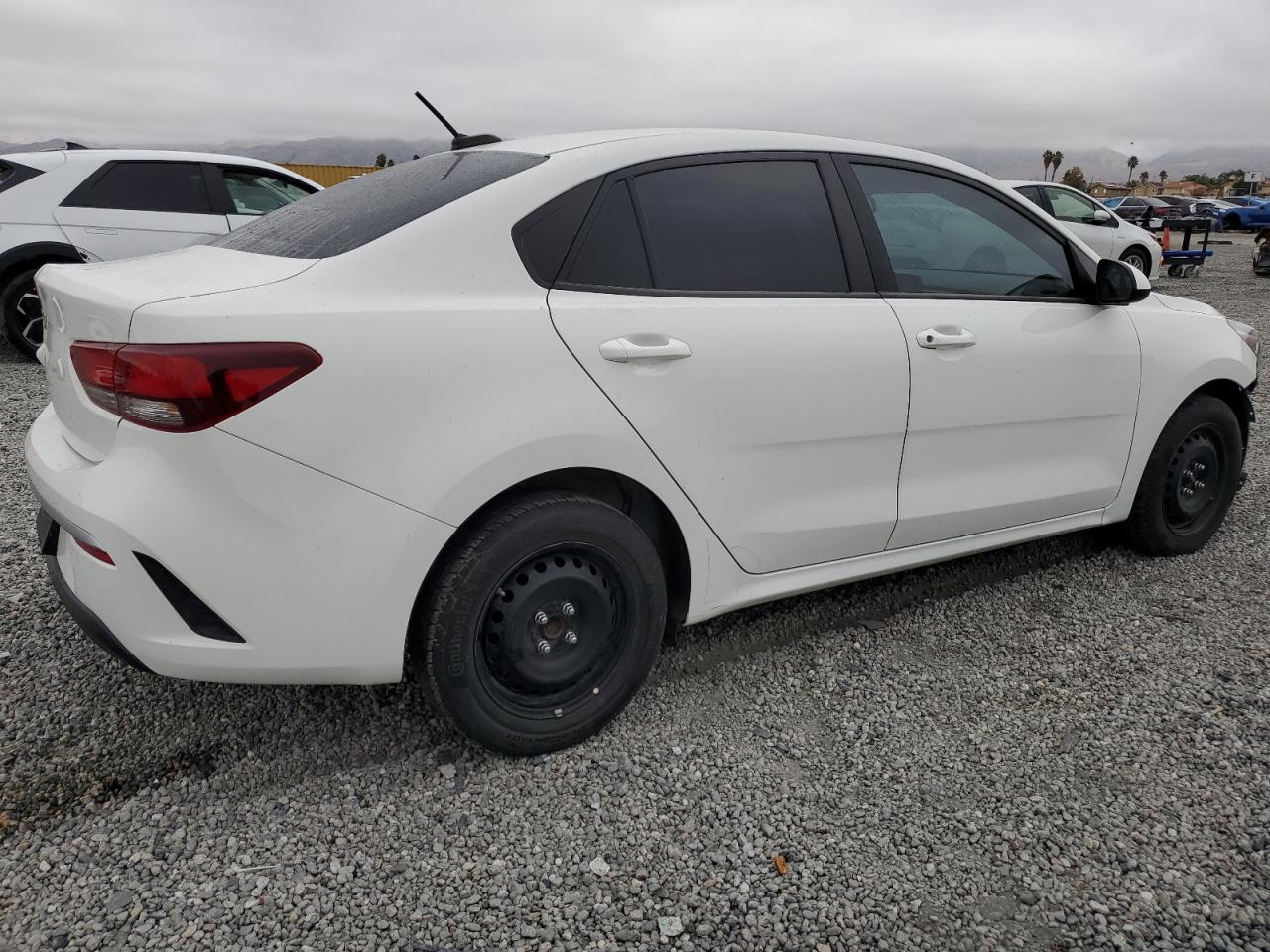 2023 KIA Rio VIN 3KPA24AD3PE520217 Copart auction photo, front end / side damage thumbnail 3