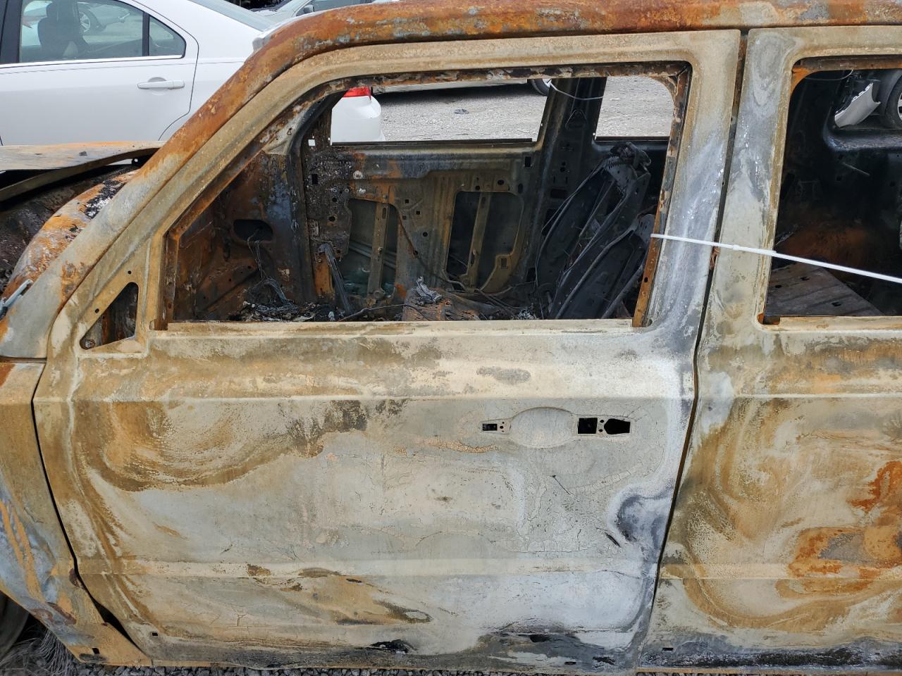 2017 Jeep Liberty (Patriot) VIN 1C4NJRBB9HD144849 Copart auction photo, burn damage thumbnail 7