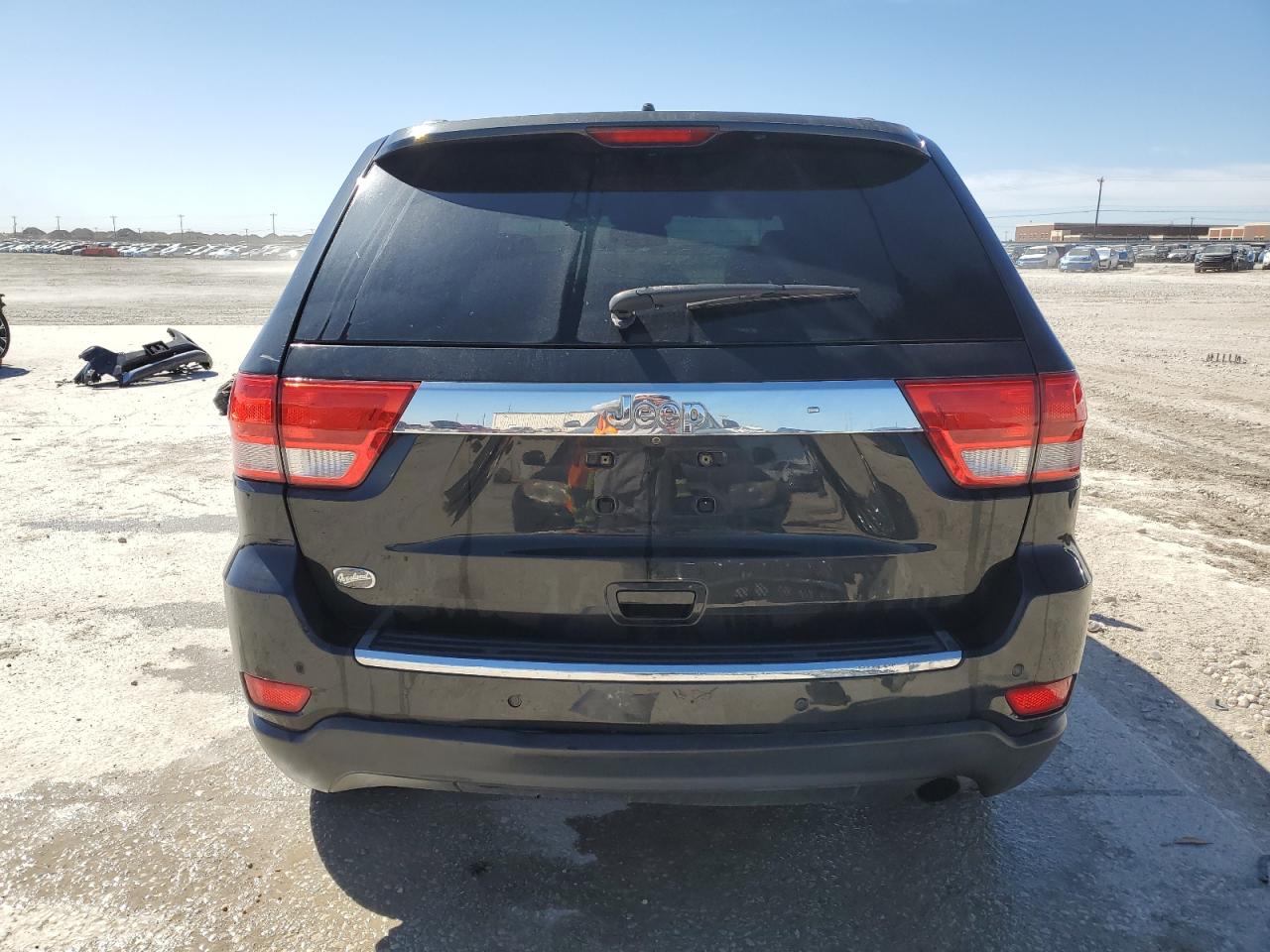 2012 Jeep Grand Cherokee VIN 1C4RJECG0CC194591 Copart auction photo, front end / minor dent/scratches damage thumbnail 6