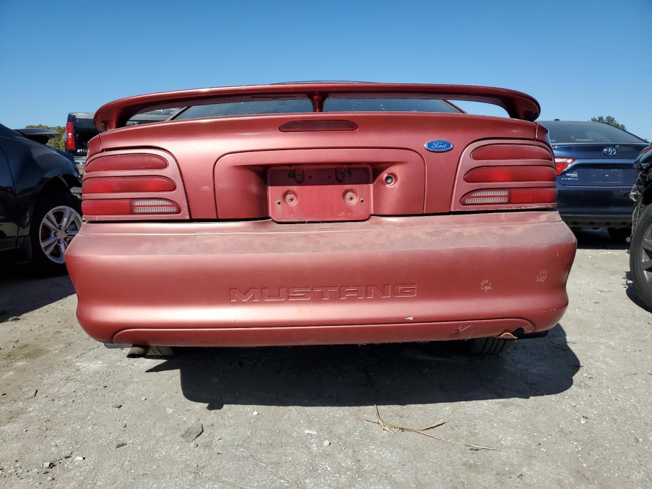 1995 Ford Mustang VIN 1FALP4047SF238064 Copart auction photo, side / all over damage thumbnail 6