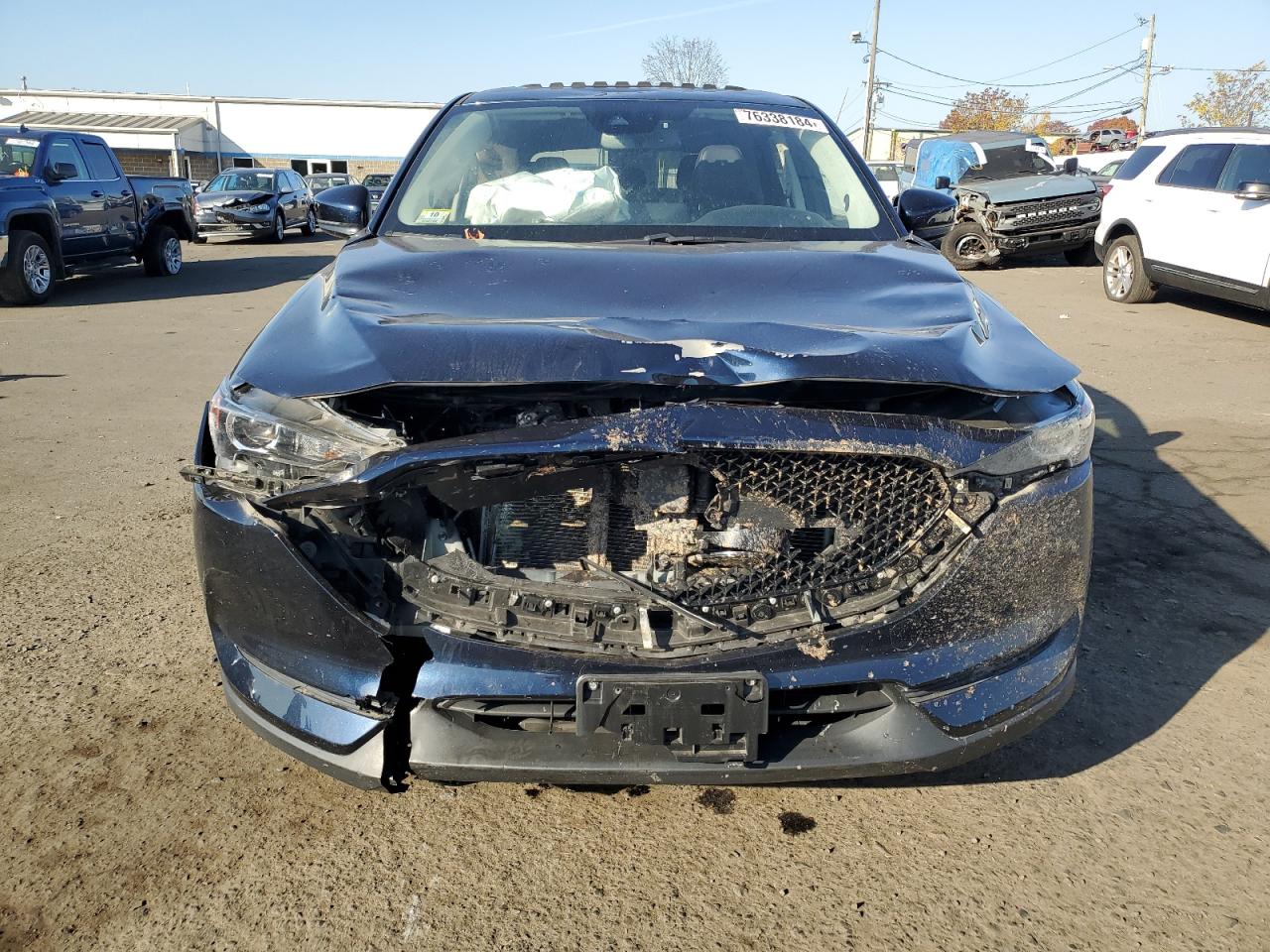 2021 Mazda CX-5 VIN JM3KFBCM1M1472197 Copart auction photo, front end / minor dent/scratches damage thumbnail 5