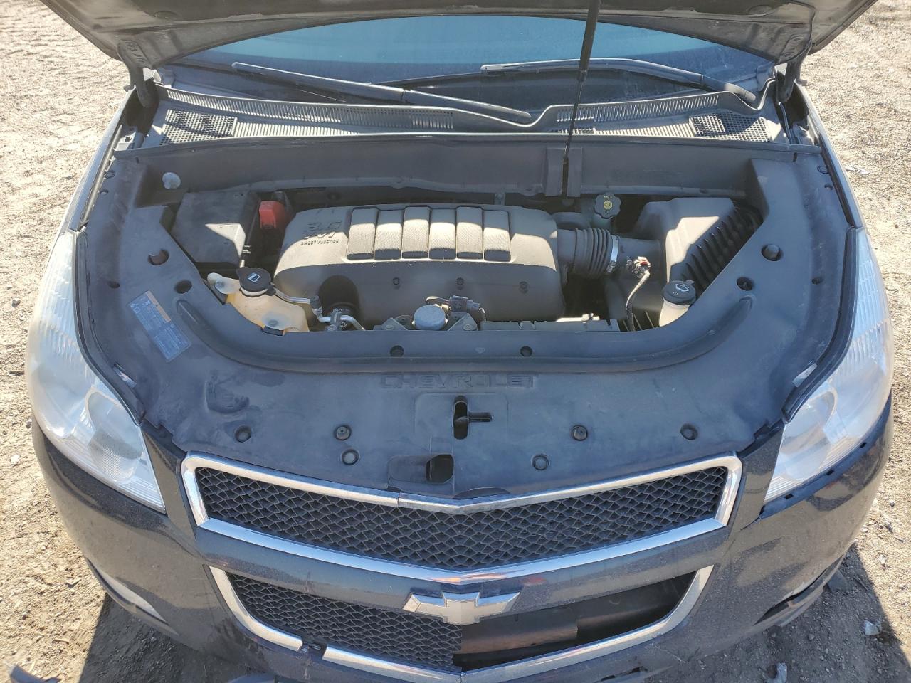 2012 Chevrolet Traverse VIN 1GNKVJEDXCJ400794 Copart auction photo, front end / hail damage thumbnail 12