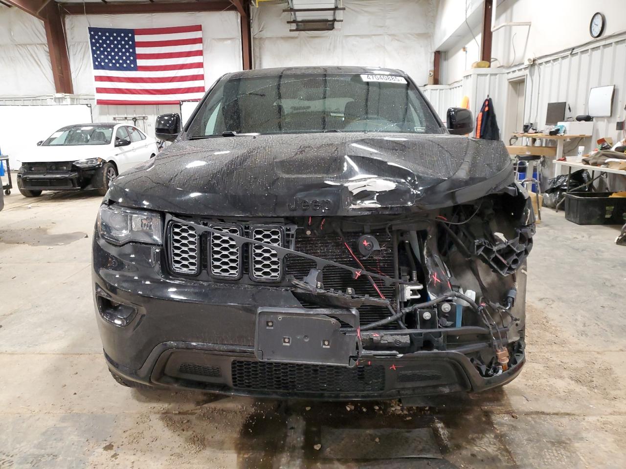 2018 Jeep Grand Cherokee VIN 1C4RJFAG0JC457023 Copart auction photo, front end / side damage thumbnail 5